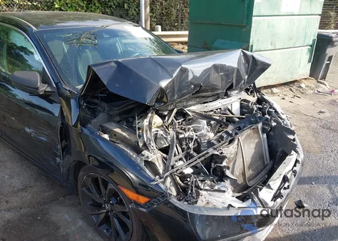 2019 Honda Civic Sport from USA, damaged, VIN 19XFC2F84KE011605